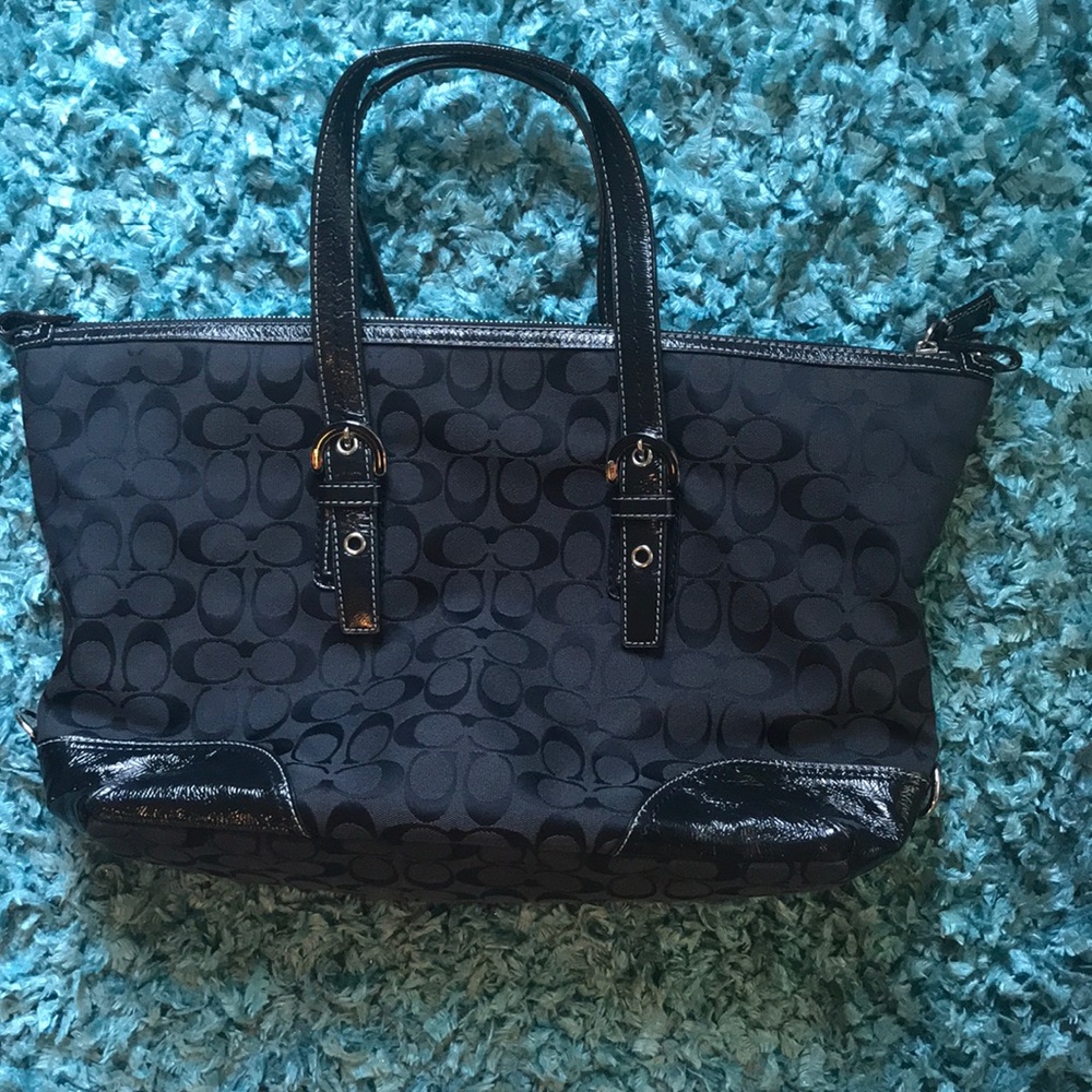 Coach tote with zipper closure, inside pockets